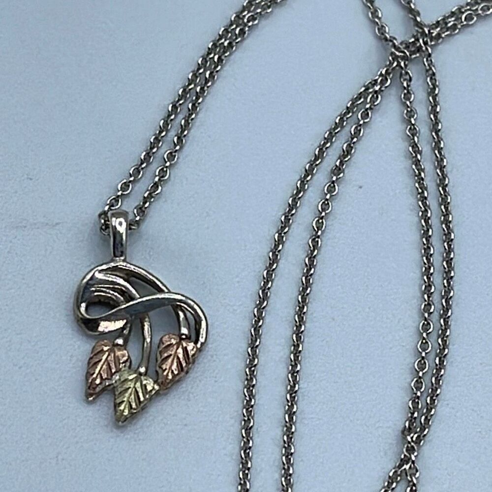 10K Dakota gold and sterling silver pendant and silver chain